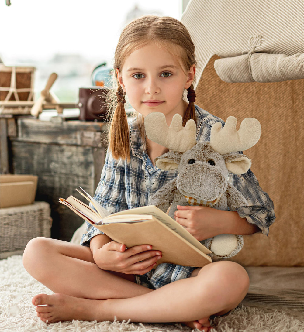 Puzzled brown moose plush invites gentle hugs at bedtime.