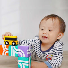 QBI screen-free play scene emphasizing imaginative, extended activity