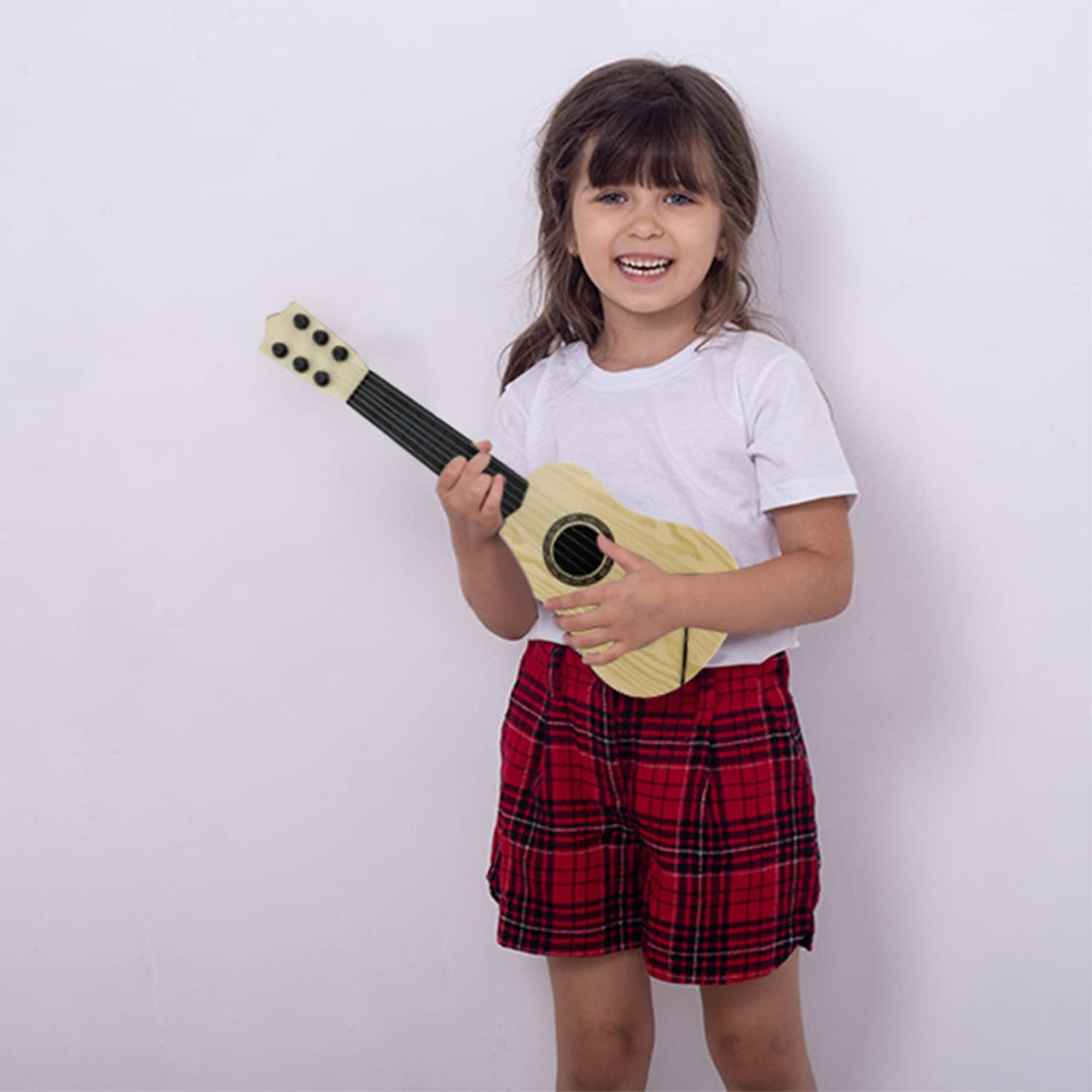 QDH toy guitar educational scene with a child and parent observing progress