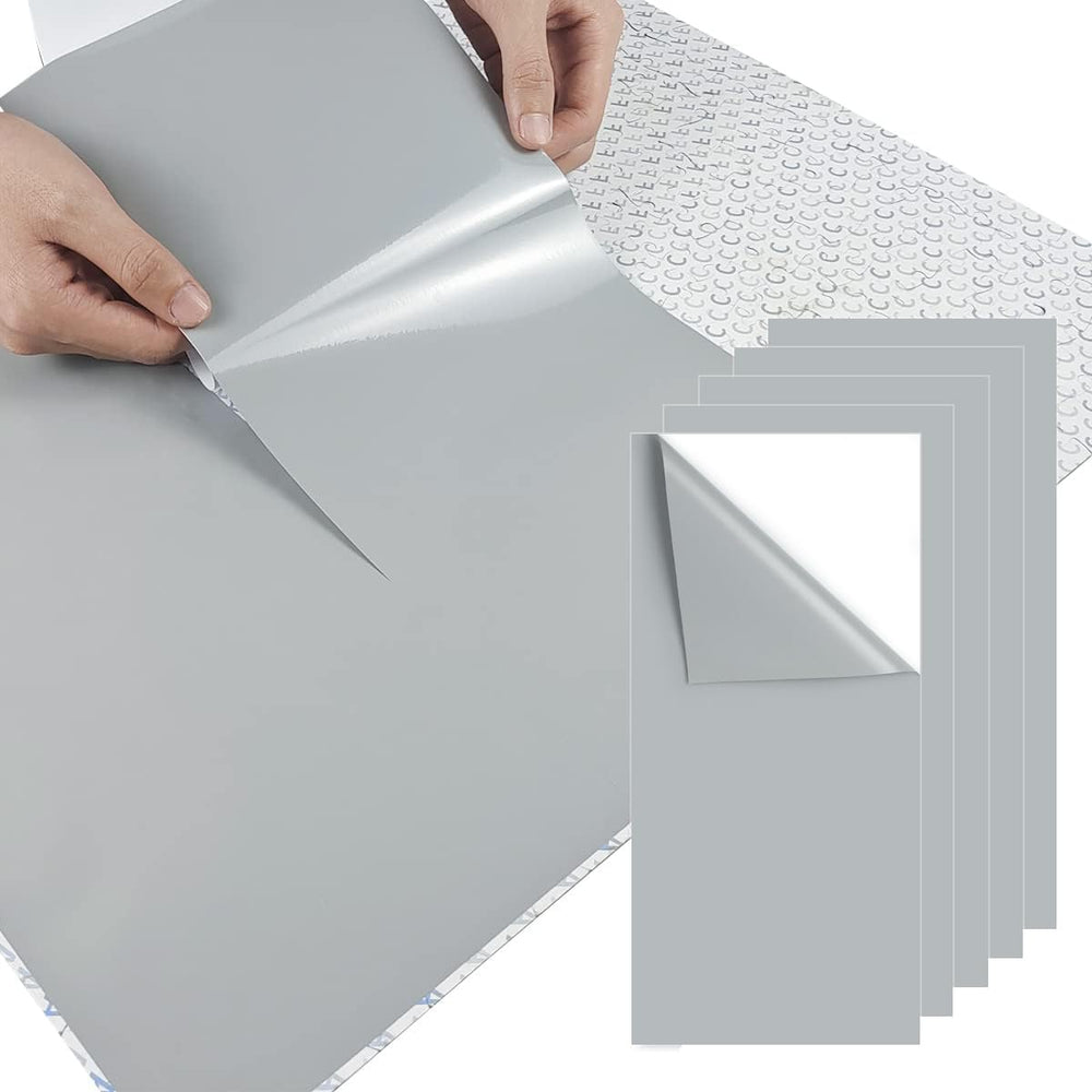 QIKSION Puzzle Saver Sheets protect a completed puzzle for wall display.