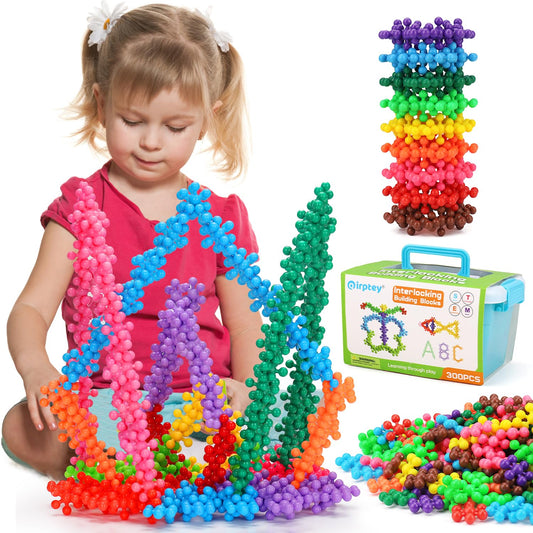 Qirptey 300-piece discs for STEM play supporting creativity and problem solving.