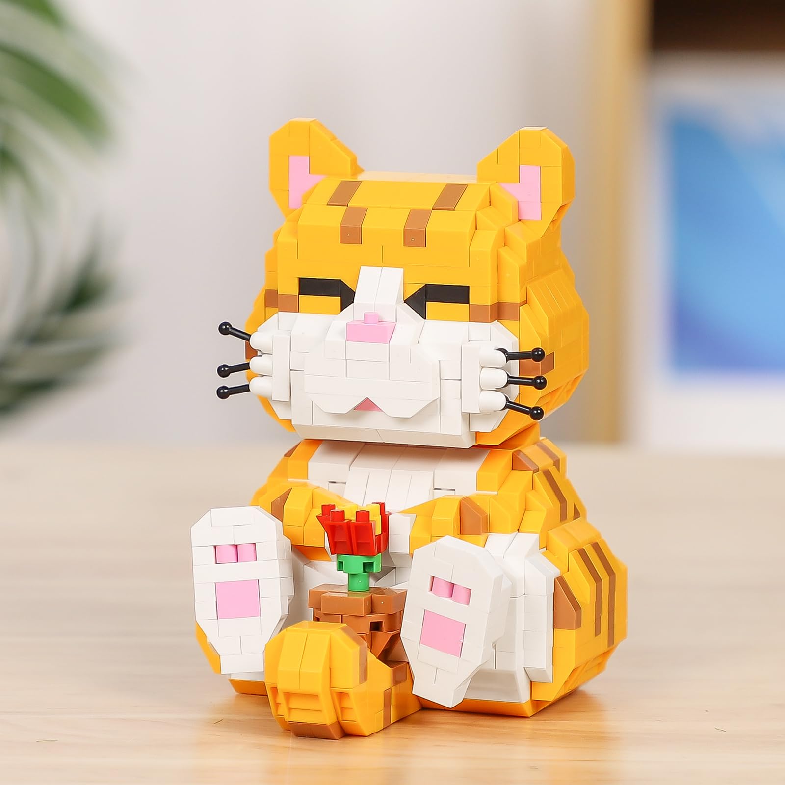 QLT QIAOLETONG tiny bricks held in hand for portable crafting