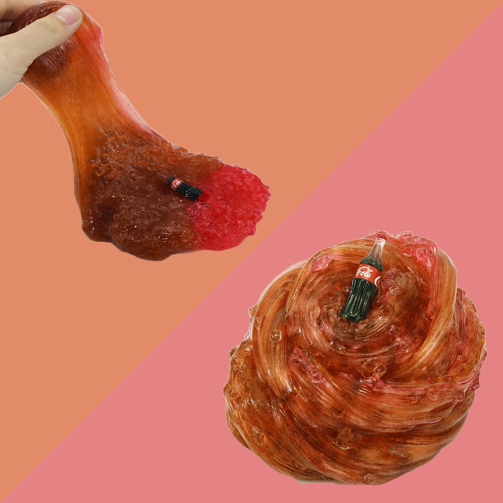 QOFRJTU Soft non-sticky slime held in hand for cooling grip relief.