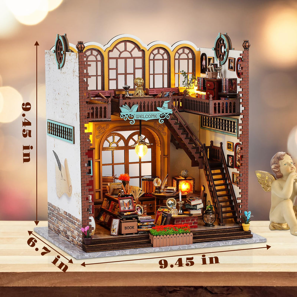 Quanquer magic book store dollhouse scene creates a warm reading corner.