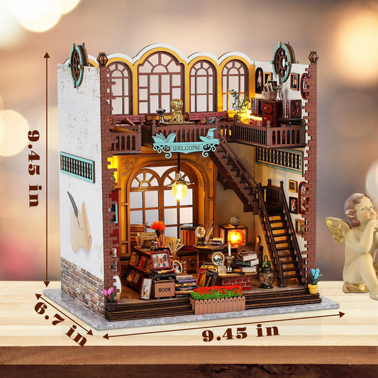Quanquer magic book store dollhouse scene creates a warm reading corner.