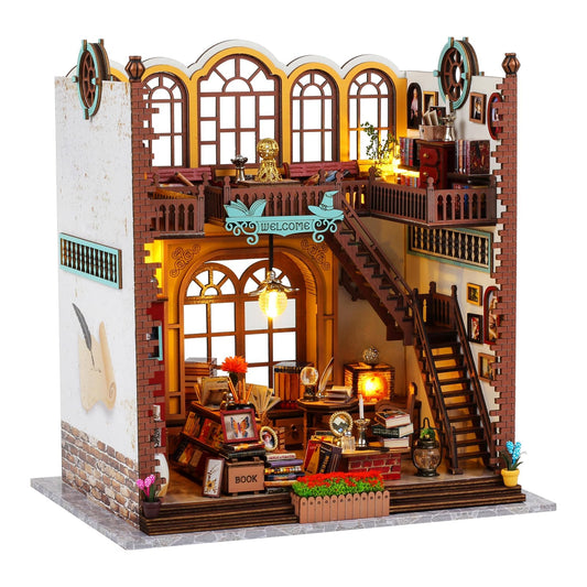 Quanquer Miniature Book Nook with LED light brightens a cozy shelf display.