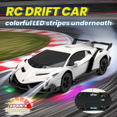 QUN XING Veneno RC car at night with bright LED lighting.