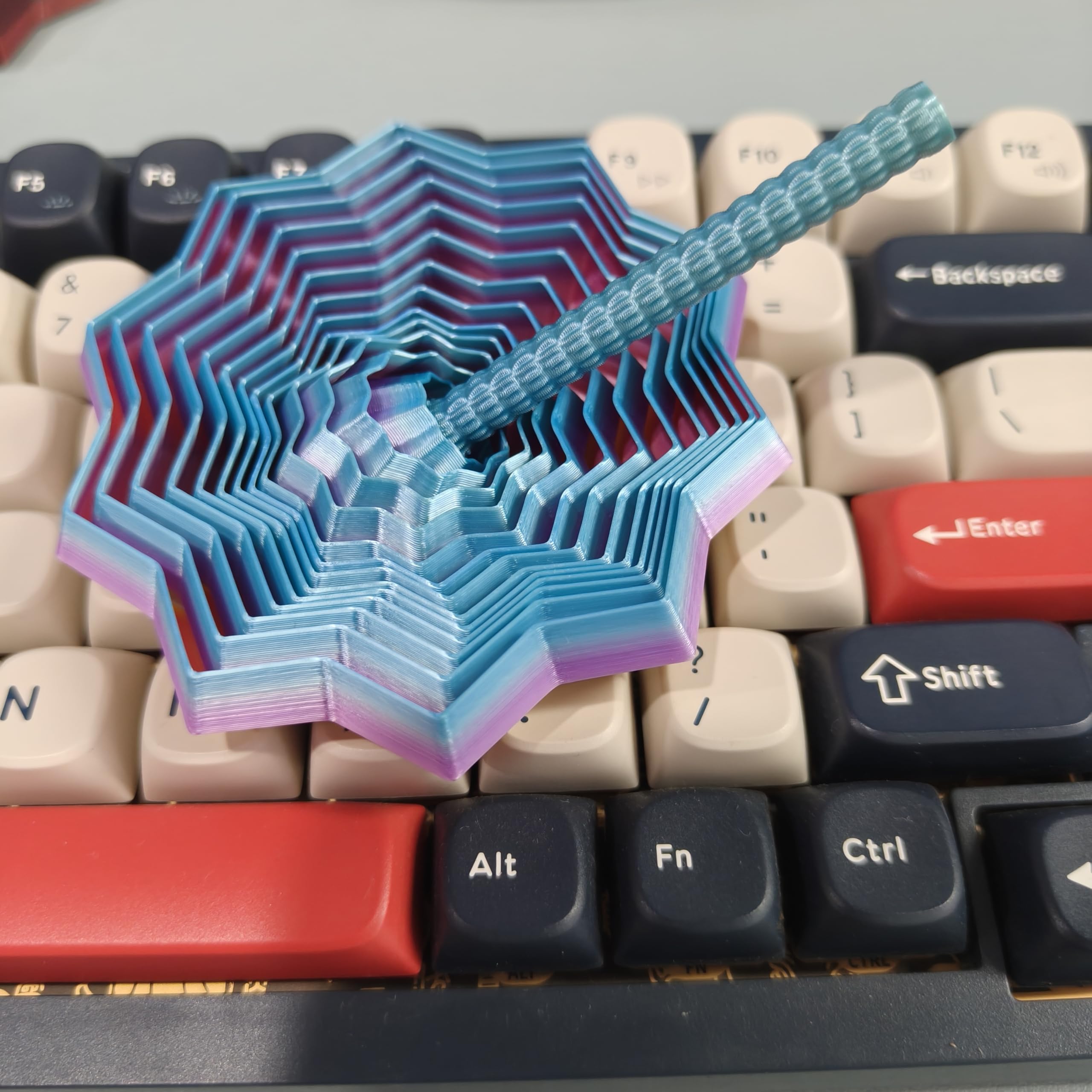 QWZFirst compact star design fits small desks and pockets.