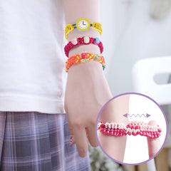 QXHOL exchanging bracelets with friends promotes sharing and fun.