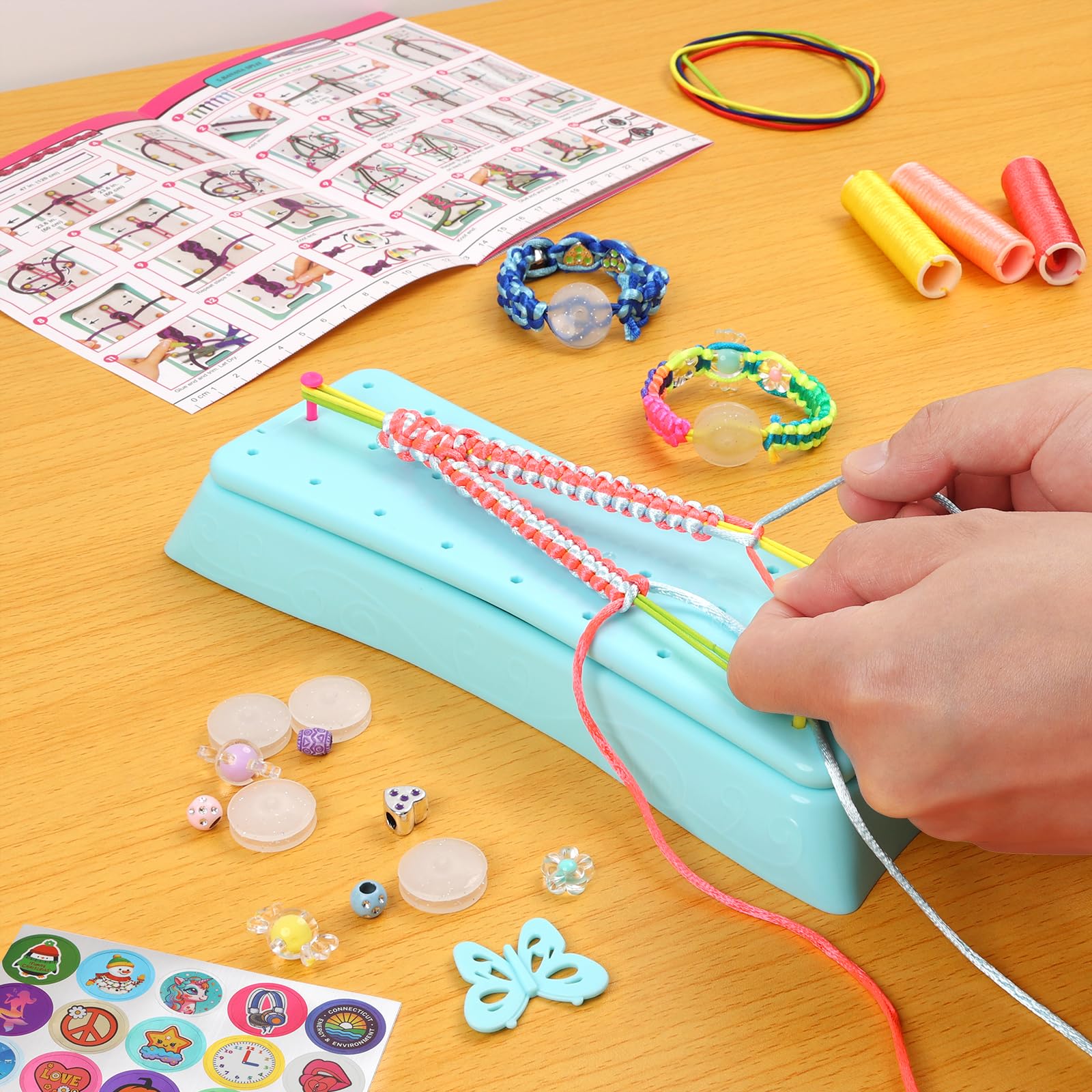 QXHOL thread spools variety enables colorful bracelet designs.