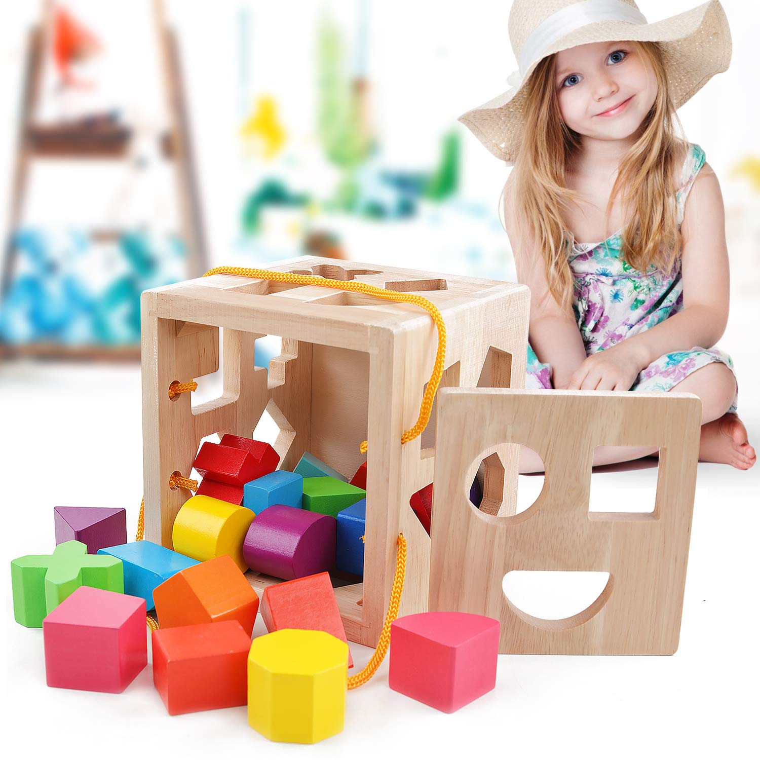 QZMTOY shape sorter features hinged lid and carrying strap for easy transport.