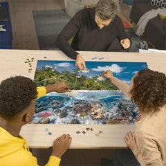 Ravensburger A Dive in The Maldives sea turtles swimming captures calming ocean vibes for solo puzzling.