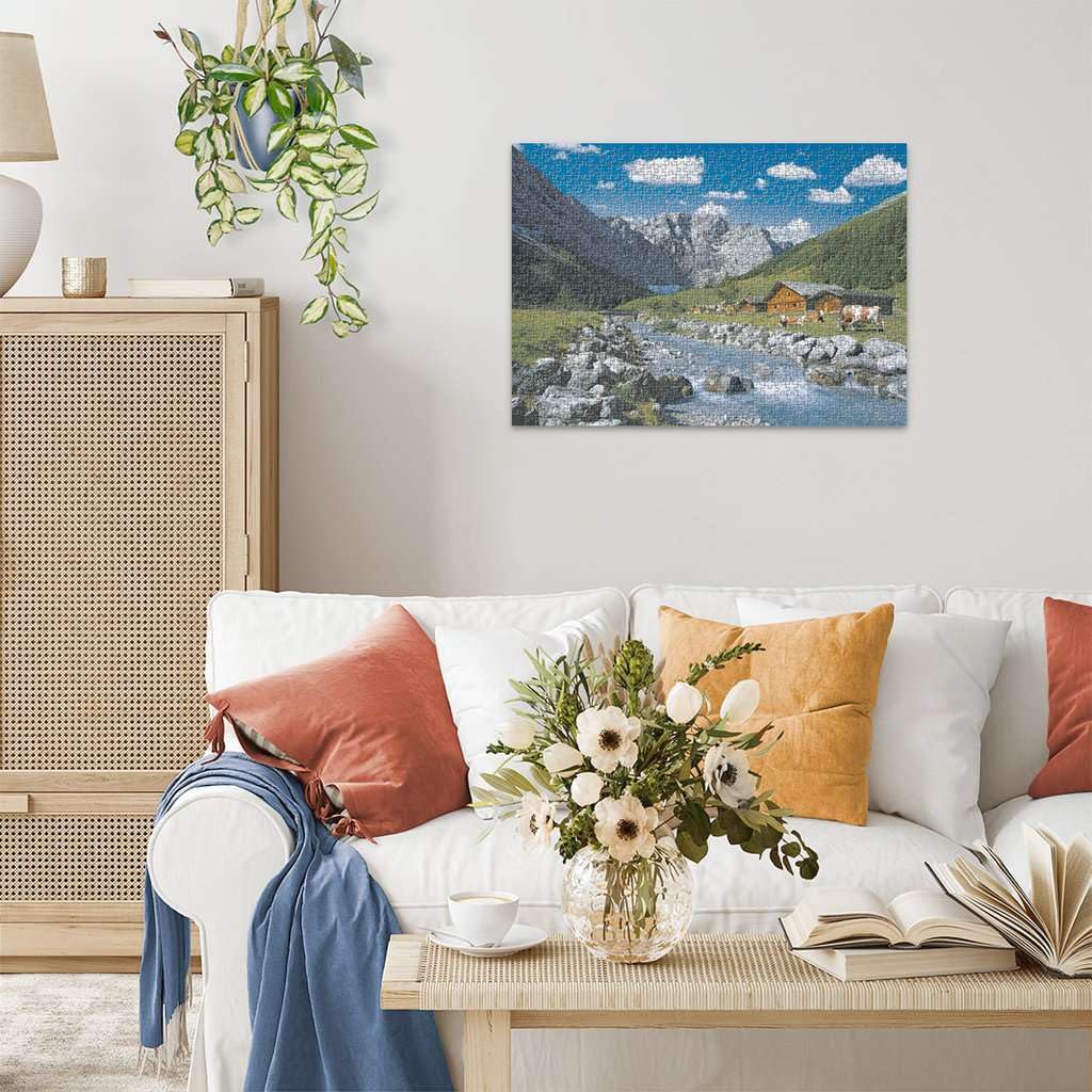 Ravensburger Austrian Mountains puzzle: quaint village below peaks for travel-inspired relaxation.