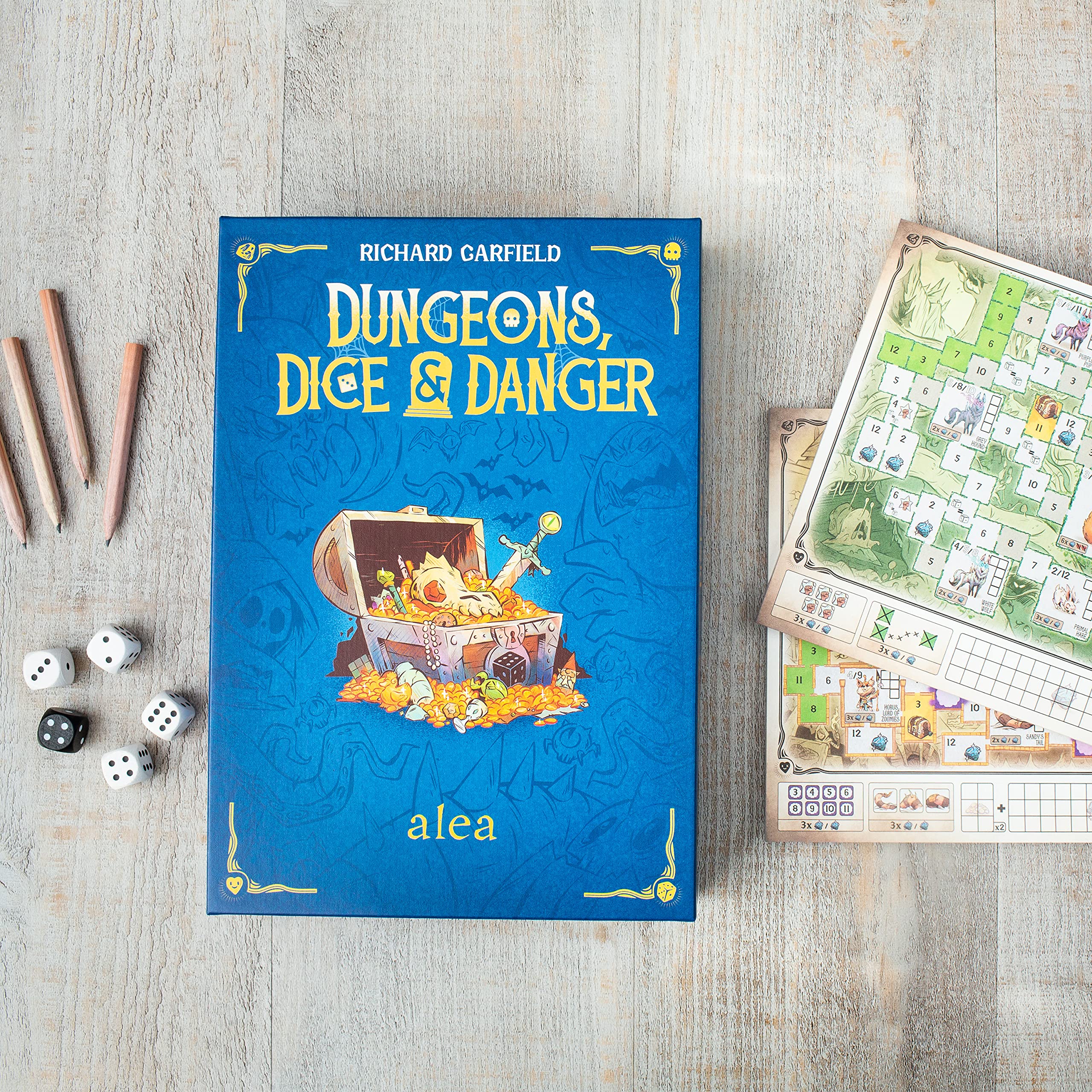Ravensburger Dungeons, Dice & Danger dice and pencils ready for strategic play