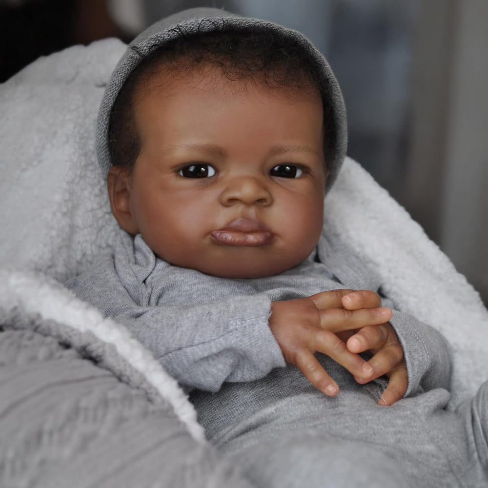 Realistic Black Boy 20-inch doll hair features curls for natural styling and dressing fun.