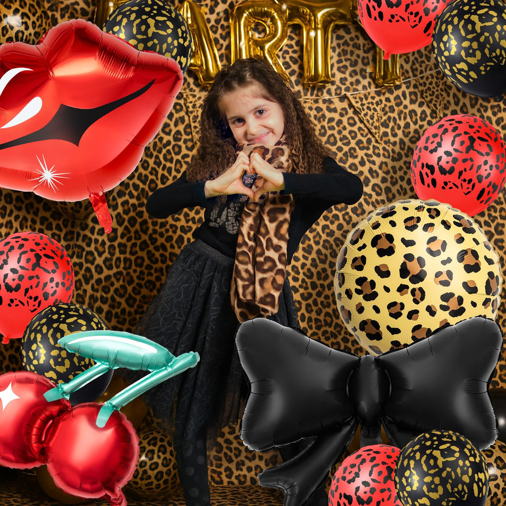 RealSpring party kit display shows cohesive red and black cheetah styling