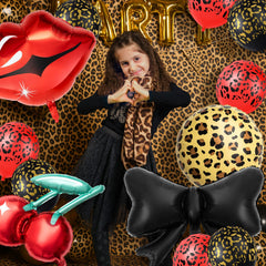 RealSpring party kit display shows cohesive red and black cheetah styling