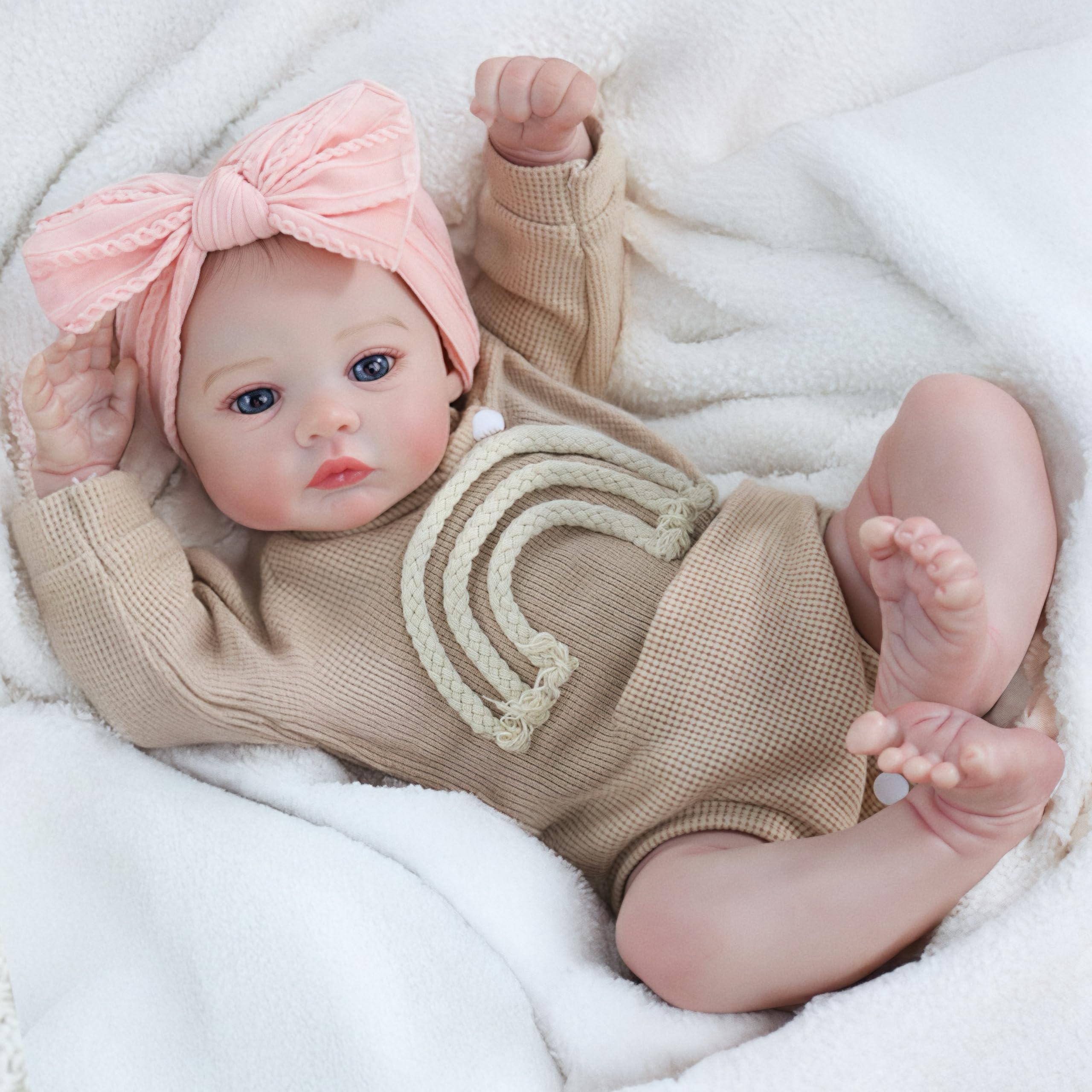 Reborn Baby Dolls Girl comes with a nursing bottle for nurturing role-play.