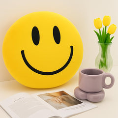 RENAMB Smiley Face Pillow with vibrant embroidery on ultra-soft plush fabric.