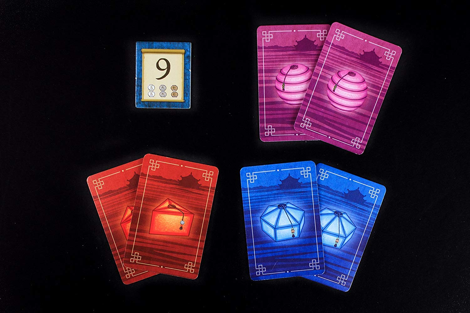 Renegade Lanterns dedication-tokens connect card sets to honor goals