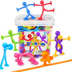 Richtim suction cup people toy on a window showing versatile attachment for creative play.