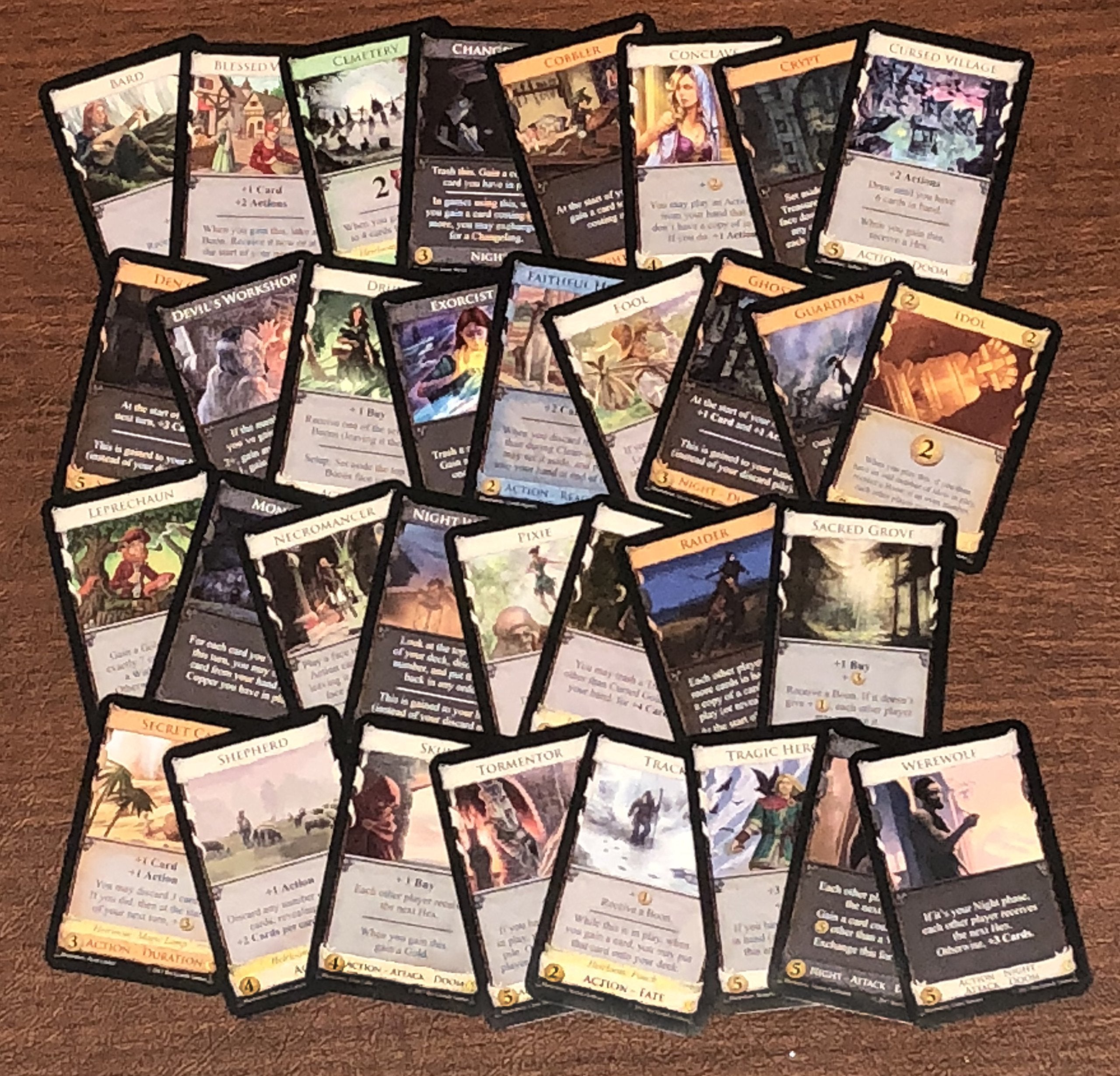Rio Grande Games Dominion Nocturne heirloom and fate cards in use.