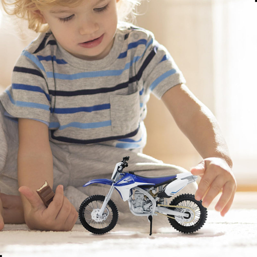 Risopen dirtbike toy desk-display-ready image, perfect for shelves.