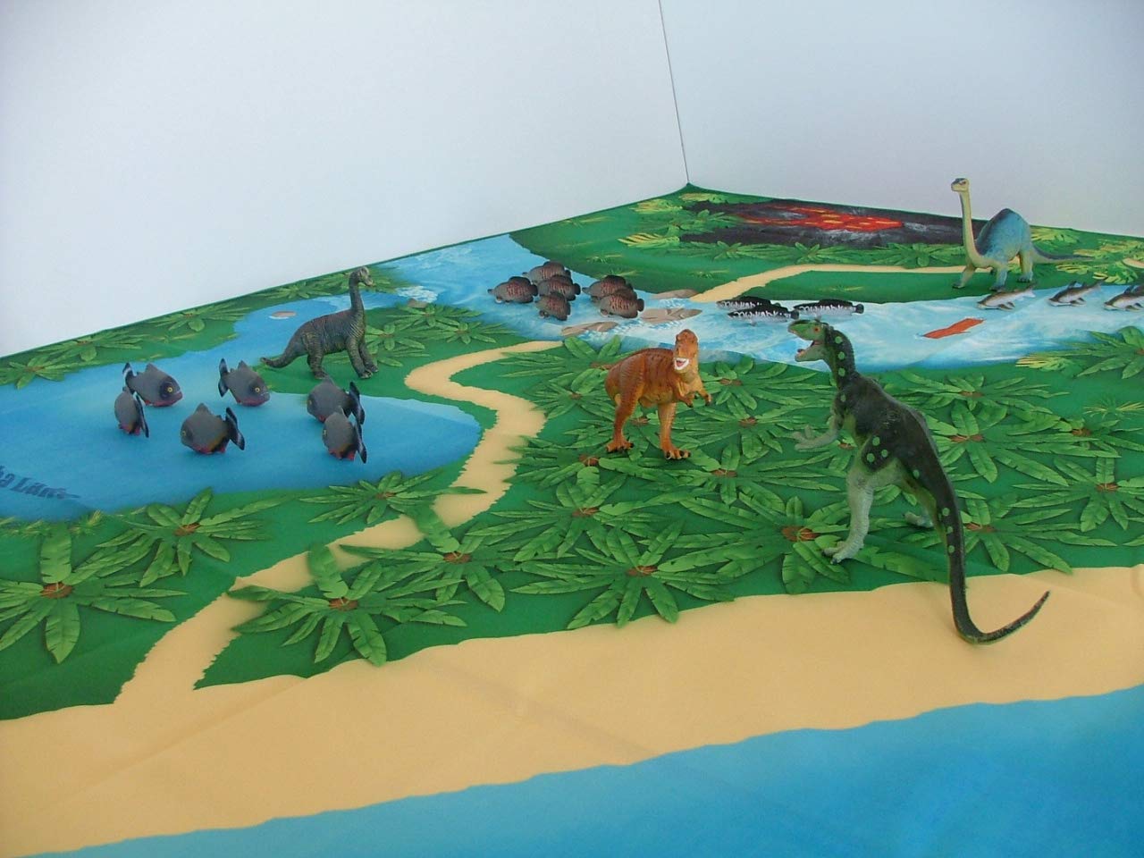 River Monster Collection Dinosaur Play Mat Foldable—portable setup for travel and playrooms.