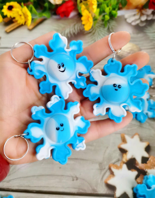Roaqua 24 packs winter snowflake fidget set ideal for holiday gifts.