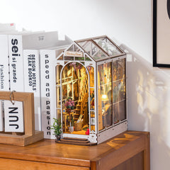 Robotime Booknook with LED light provides a warm glow for cozy displays.