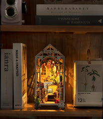Robotime Books and plants on shelves form a lush mini scene.