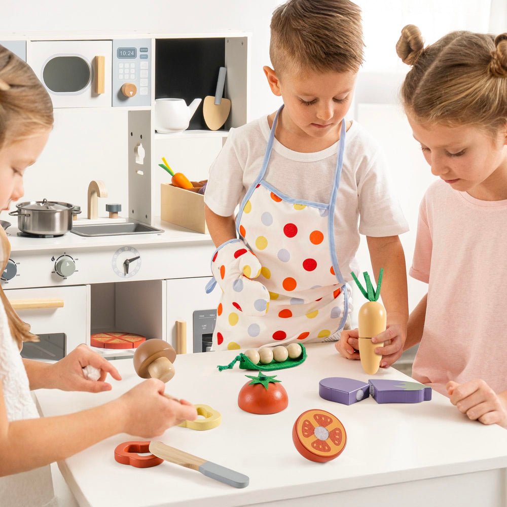 ROBOTIME child playing in a kitchen with wooden food set.