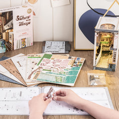 ROBOTIME Sakura Tram compact desk display for a stylish home office.