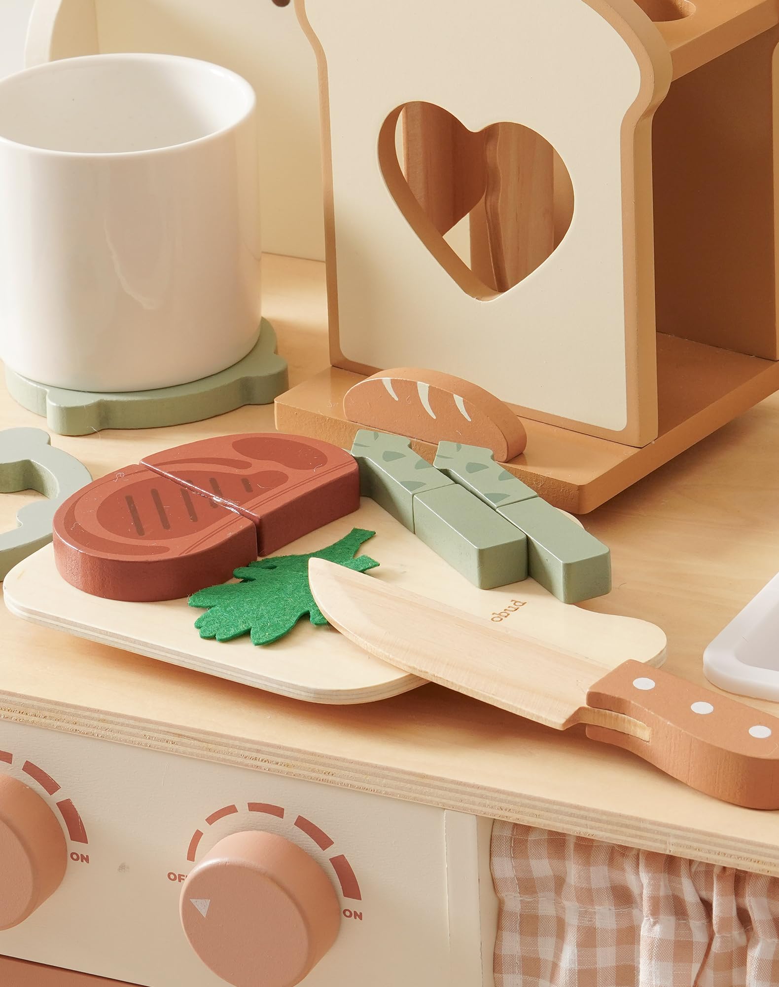 ROBUD Montessori-inspired design sparks curiosity during role-play cooking.