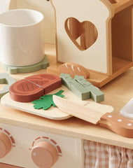 ROBUD Montessori-inspired design sparks curiosity during role-play cooking.