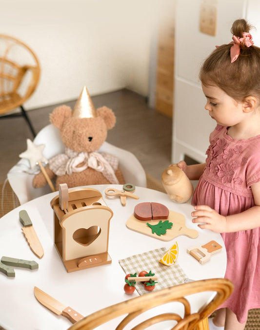 ROBUD play food including bread and lemon for lifelike meals during pretend play.