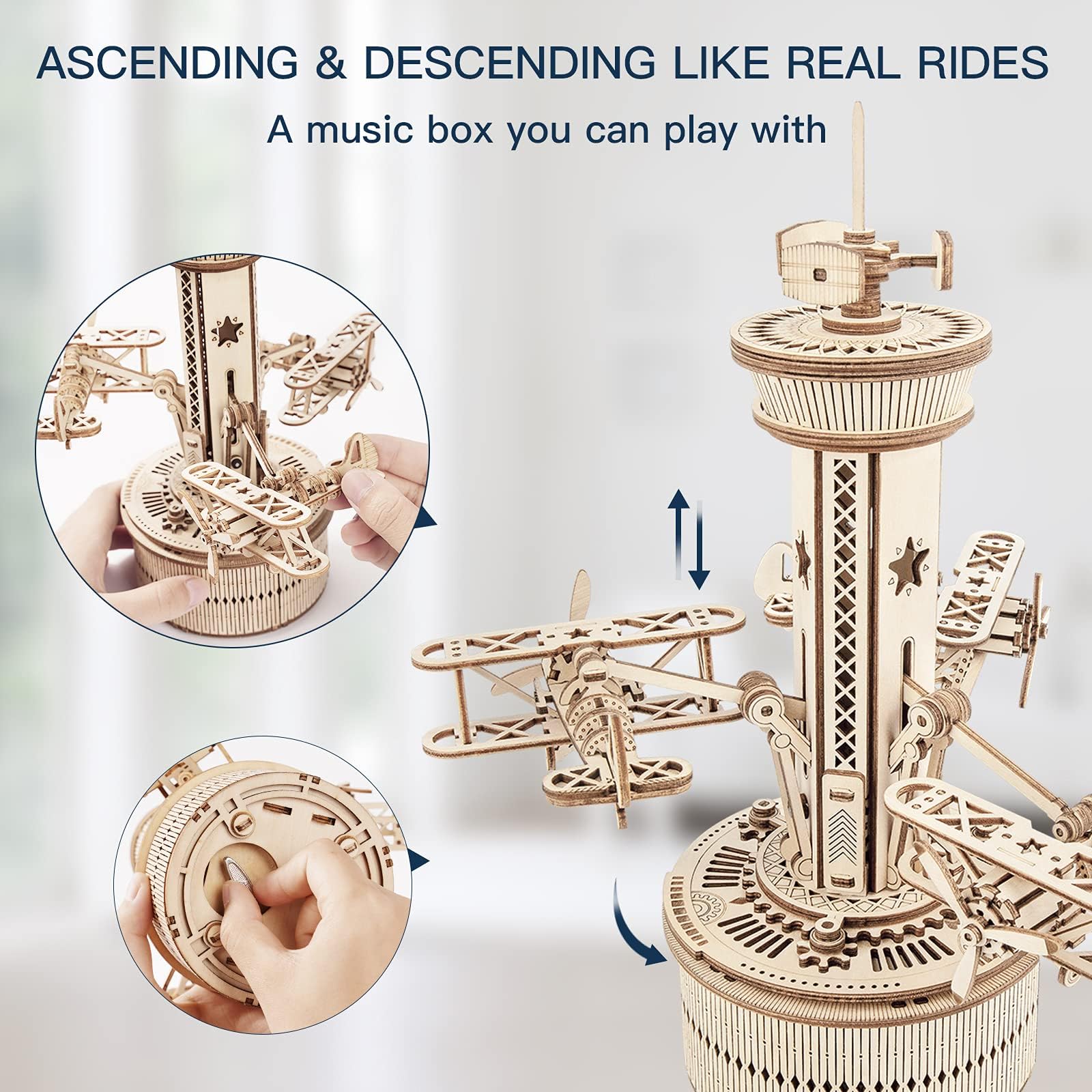 ROKR windup mechanism activates rotating tower and moving biplanes