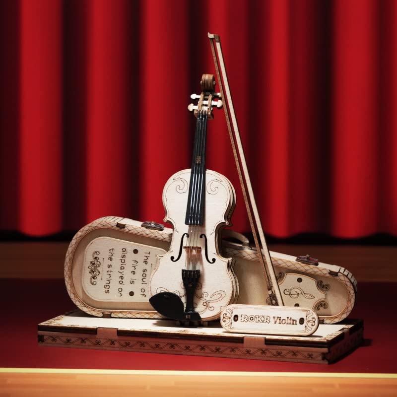 ROKR family assembly activity featuring a violin model fosters teamwork.