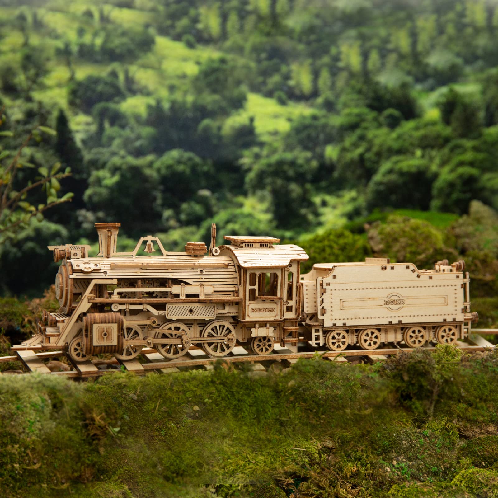 Hands assemble pieces in a step-by-step ROKR process.