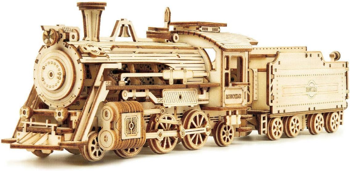 ROKR model car kit: wooden parts laid out for precise, focused build.