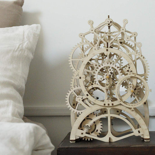 ROKR pendulum clock puzzle pieces popping out from laser-cut sheets for quick assembly