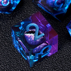 Beholder Dragon Eye dice with liquid core resin shimmer in blue purple.