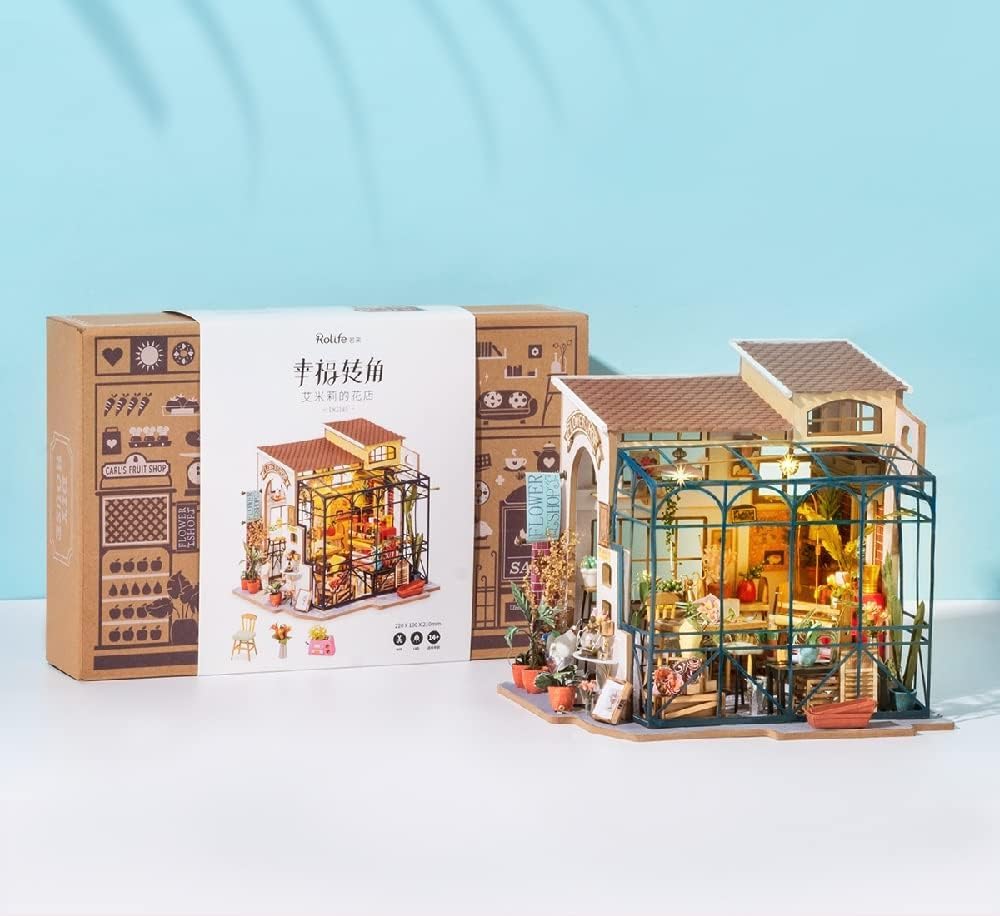 Rolife DIY Miniature House Kit desk area with tools for hands-on building.