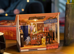 Rolife miniature dollhouse cabinet detail highlighting shelves and bottles