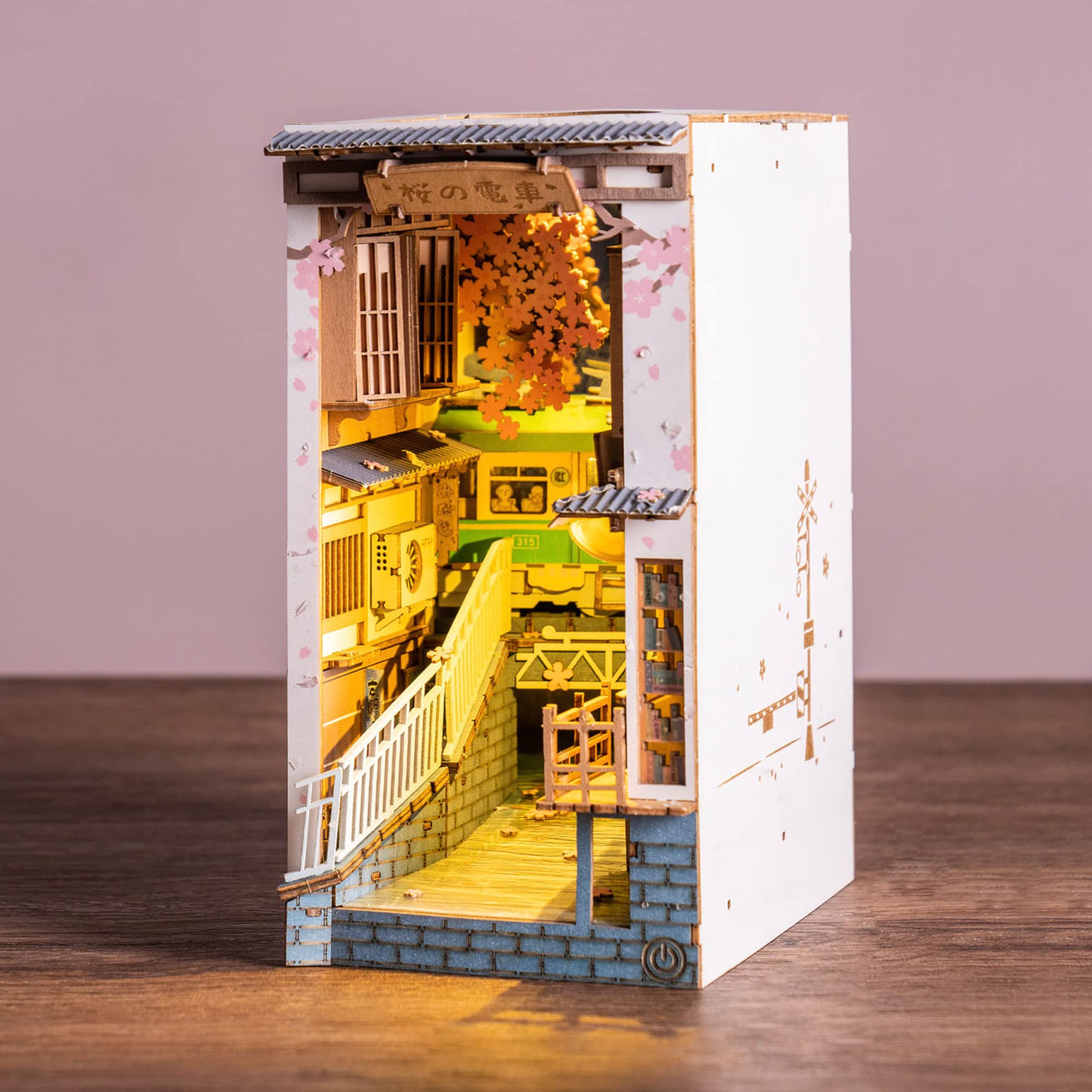 Rolife Sakura Densya river scene with glowing lights enhances display decor