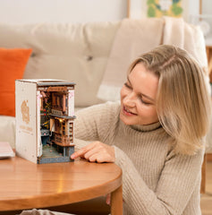Rolife Sakura Densya signal lights illuminate the scene for cozy shelves