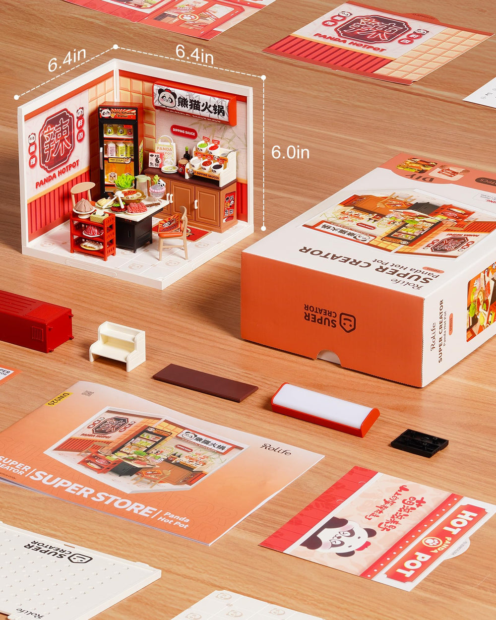 Rolife assembled dollhouse with panda figurines creates a charming tabletop display