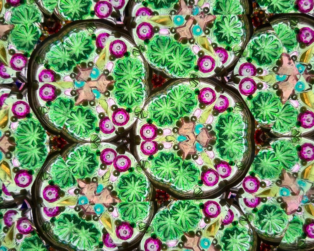 ROORKEE kaleidoscope color-filled glass beads on turning wheels.