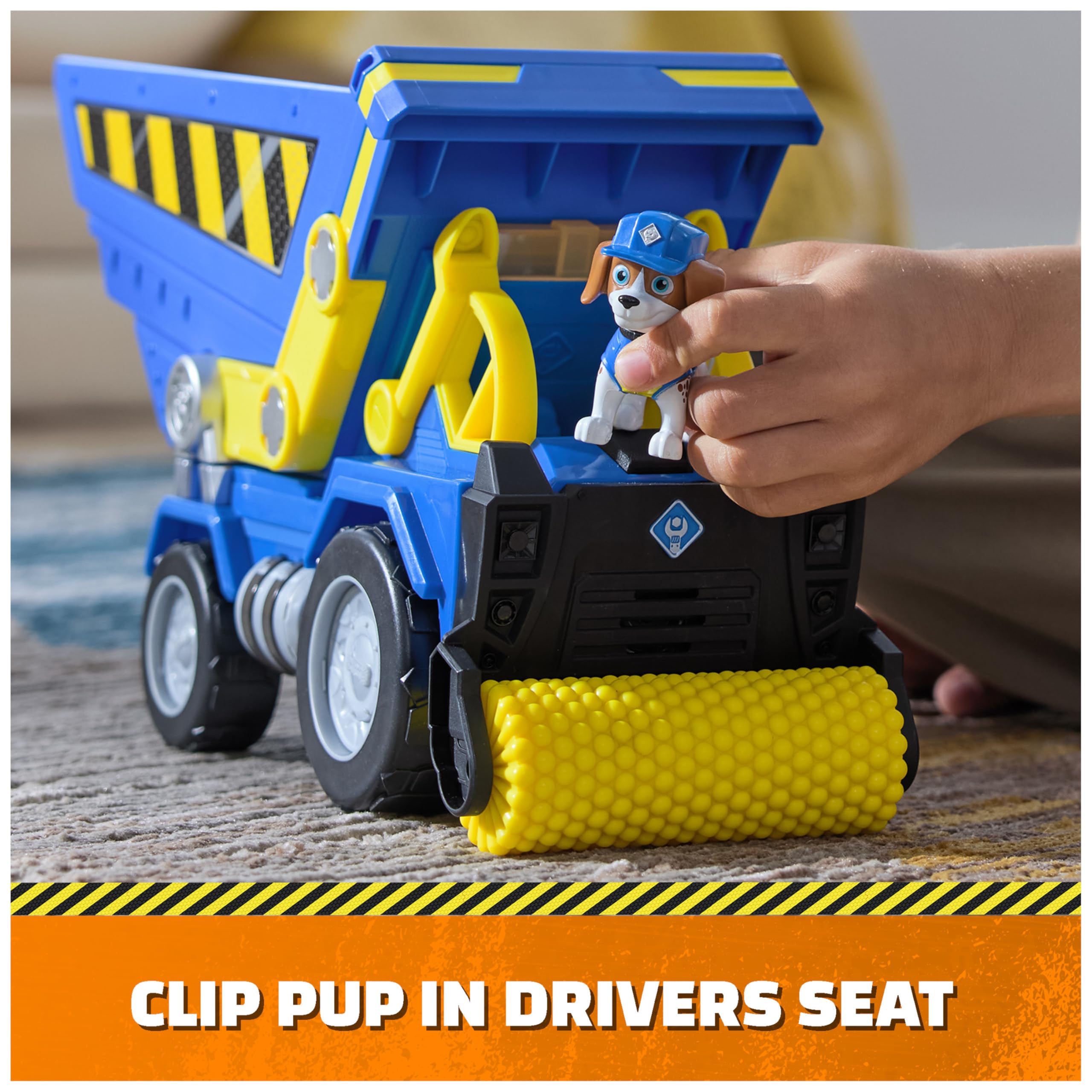 Compactor roller feature to flatten pretend dirt during construction play.