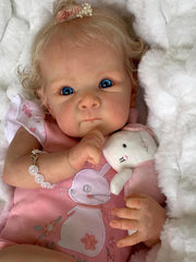 RXDOLL 18inch full-body doll held to show compact size and life-like form.